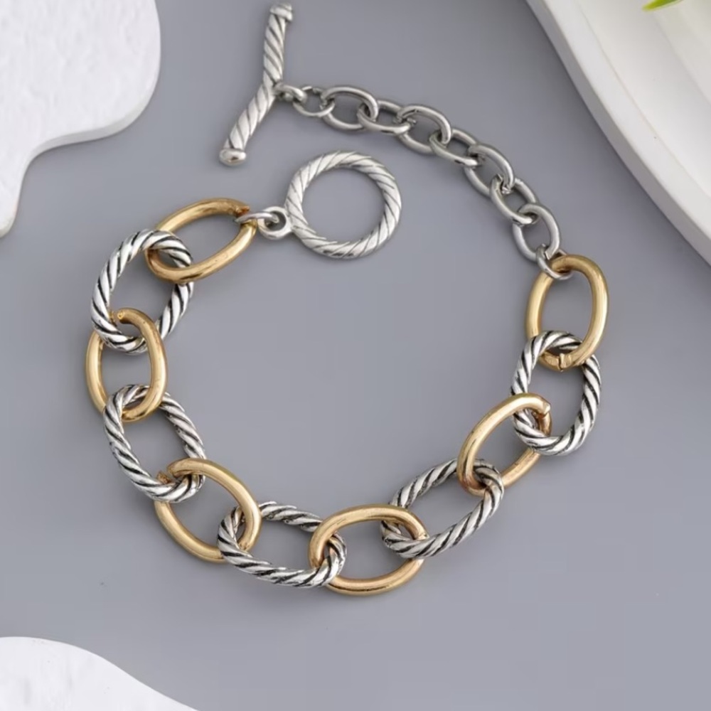 Anthropologie Two-Tone Twisted Link Bracelet in Gold & Silver